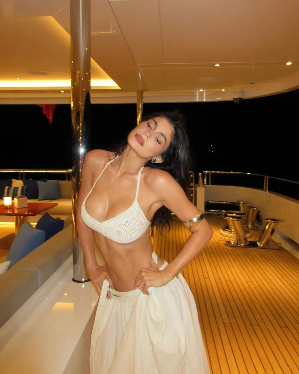 Kylie posed in a white crochet bikini and low-rise skirt. Credit: Instagram