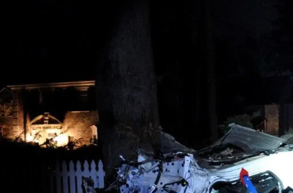 The crash scene from November 17, 2023, when driver Kiernan Tague lost control of a BMW at 105 mph, killing his passenger Flynn MacKrell. Credit: Grosse Pointe Farms police