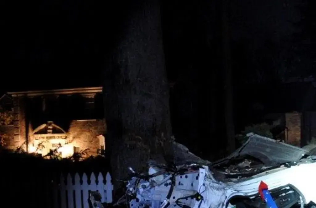 The crash scene from November 17, 2023, when driver Kiernan Tague lost control of a BMW at 105 mph, killing his passenger Flynn MacKrell. Credit: Grosse Pointe Farms police
