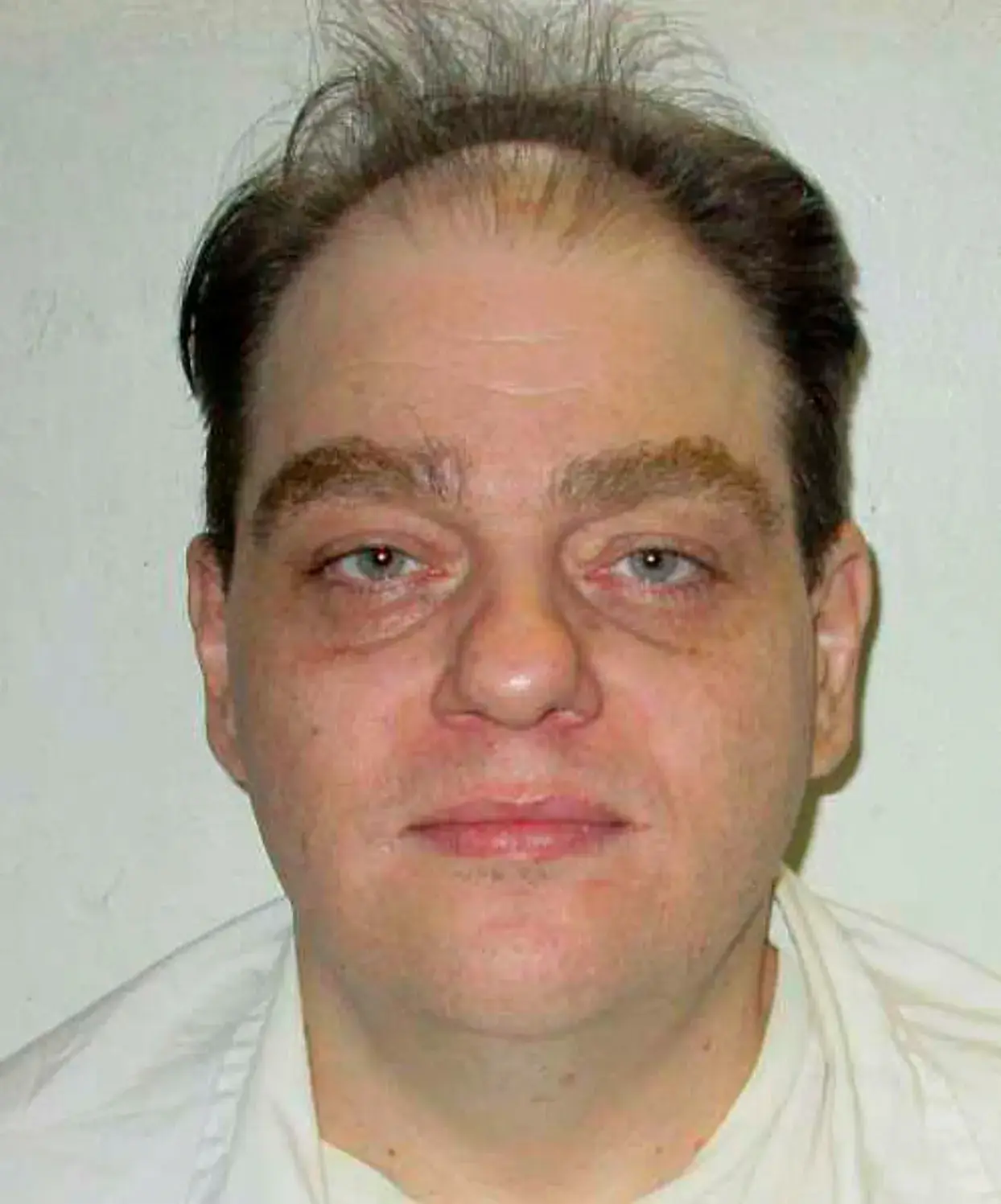 Son of murdered woman pleads with officials to stop killer's execution for heartbreaking reason