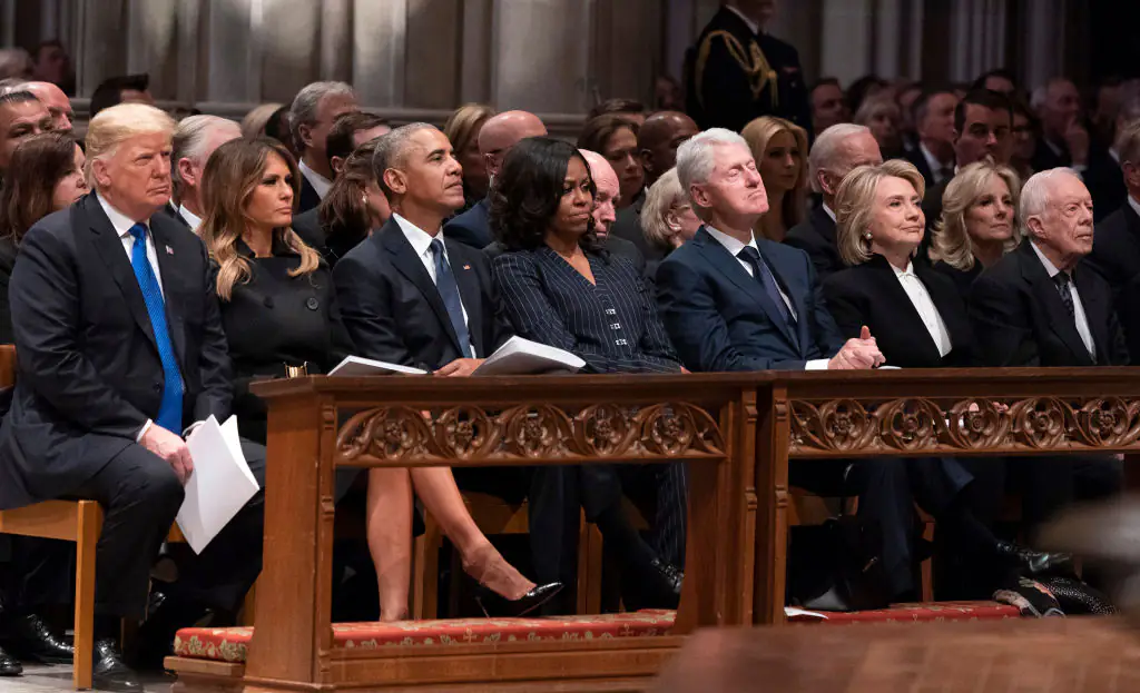 Barack Obama (third left) also released a statement following Carter's death. Credit: Chris Kleponis-Pool/Getty