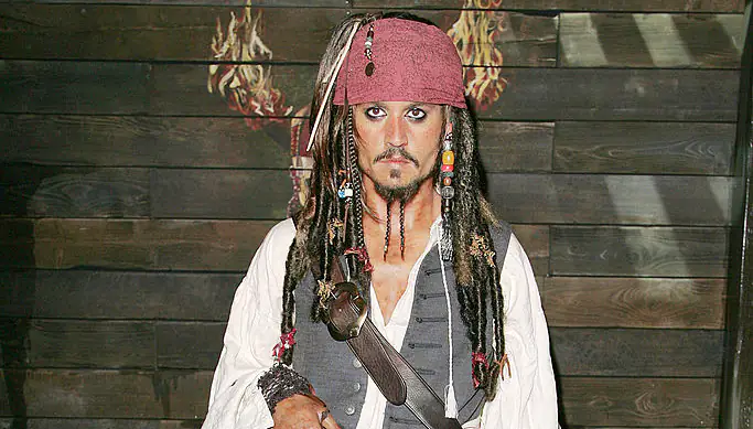Johnny Depp once again becomes Captain Jack Sparrow as he surprises children in hospital