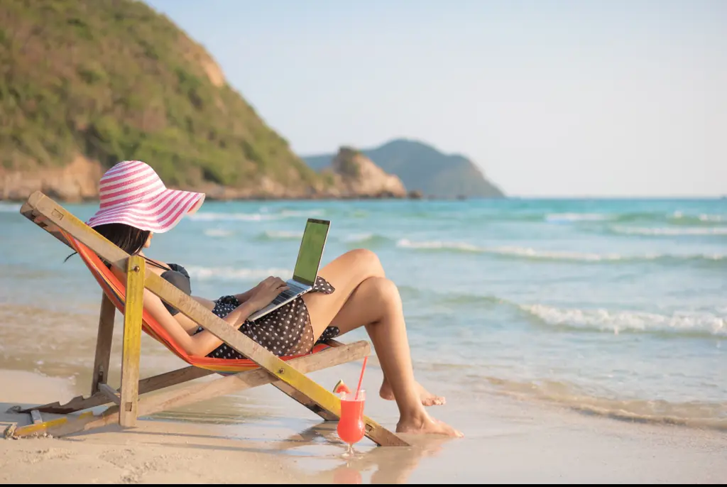 Some people can't detach from work when on vacation. Credit: Witthaya Prasongsin / Getty