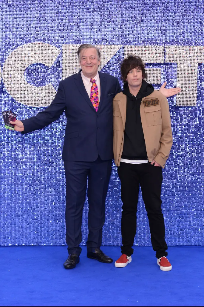 Stephen Fry and Elliott Spencer attend the Rocketman UK Premiere. Credit: Joe Maher / Getty