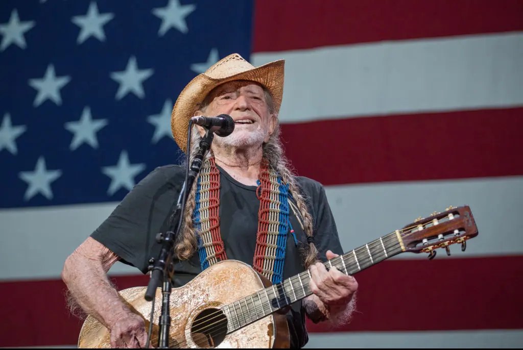 Willie Nelson smokes weed in place of other vices. Credit: Rick Kern / Getty