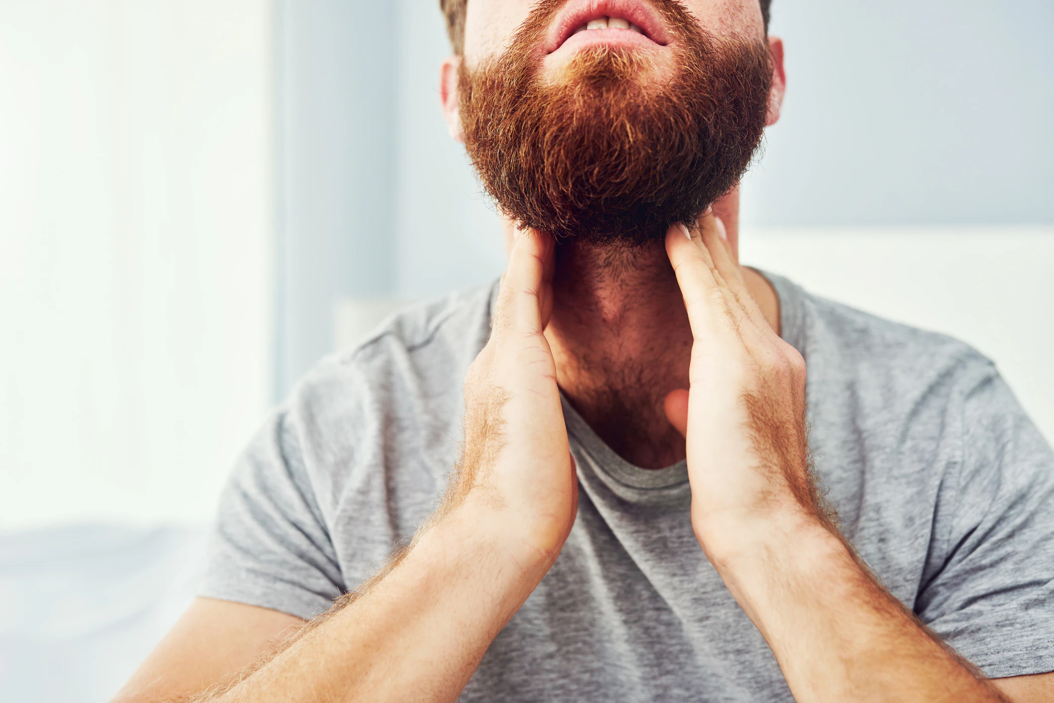 One of the most common signs of HPV-related throat cancer is a painless lump in the neck. Credit: Moyo Studio / Getty