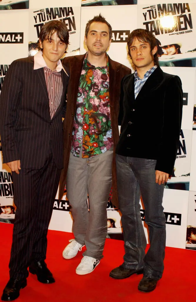 Y Tu Mama Tambien actors Diego Luna and actor Gael Garcia Bernal with director Alfonso Cuaron. Credit: Carlos Alvarez / Getty