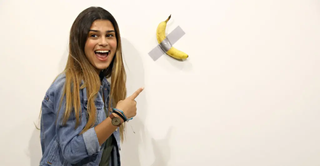 Man who bought banana taped to wall for $6.24 million at auction reveals what he has done with the fruit