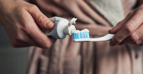 Dentist issues urgent warning to anyone who brushes their teeth in the shower