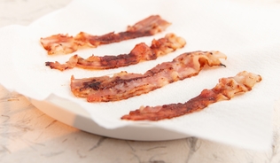 Experts issue warning to people who cook bacon in an air fryer