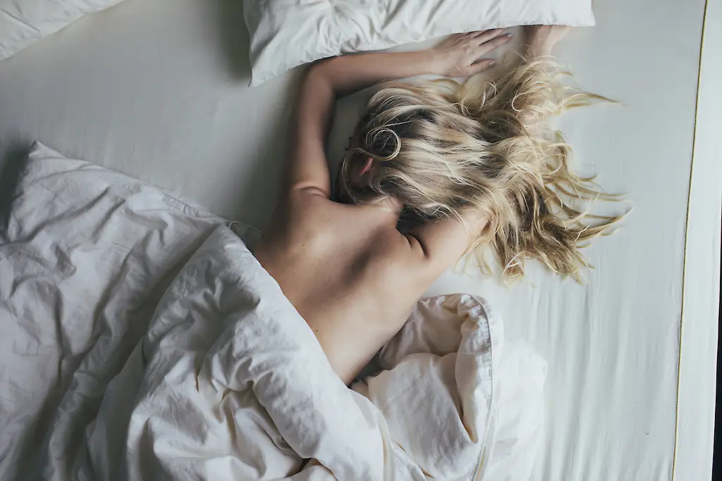 Experts warn against sleeping on the stomach. Credit: FreshSplash / Getty