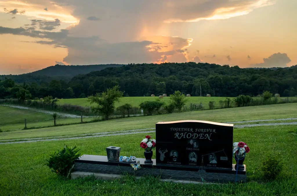 A headstone for five members of the murdered family. Credit: The Washington Post / Getty Images 