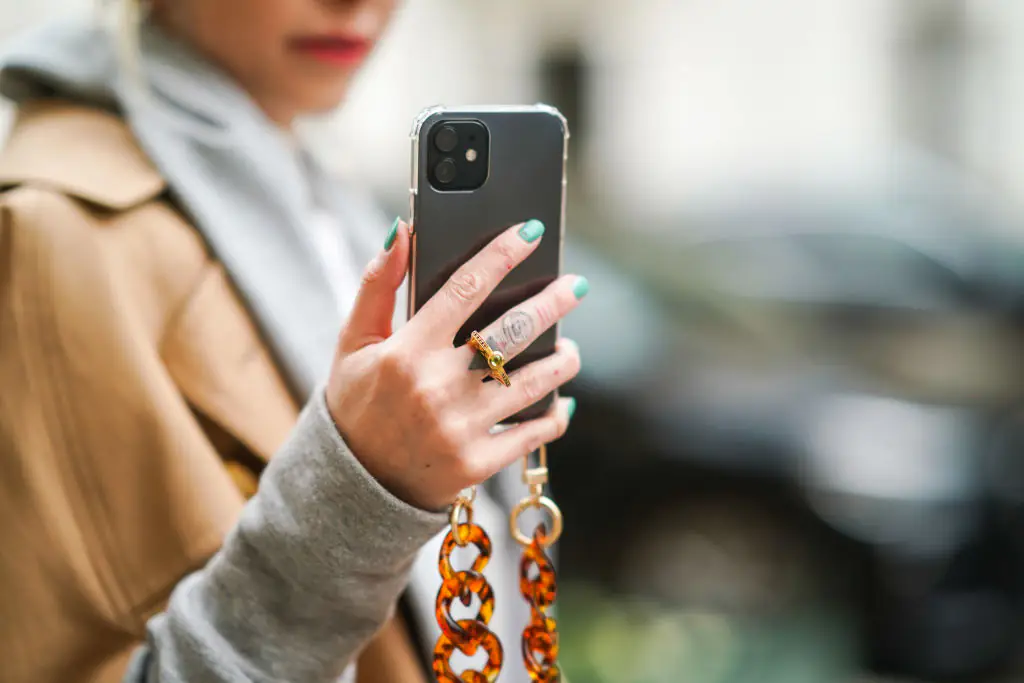 Many people have claimed that they are suffering from ‘phone pinky’. Credit: Edward Berthelot / Getty