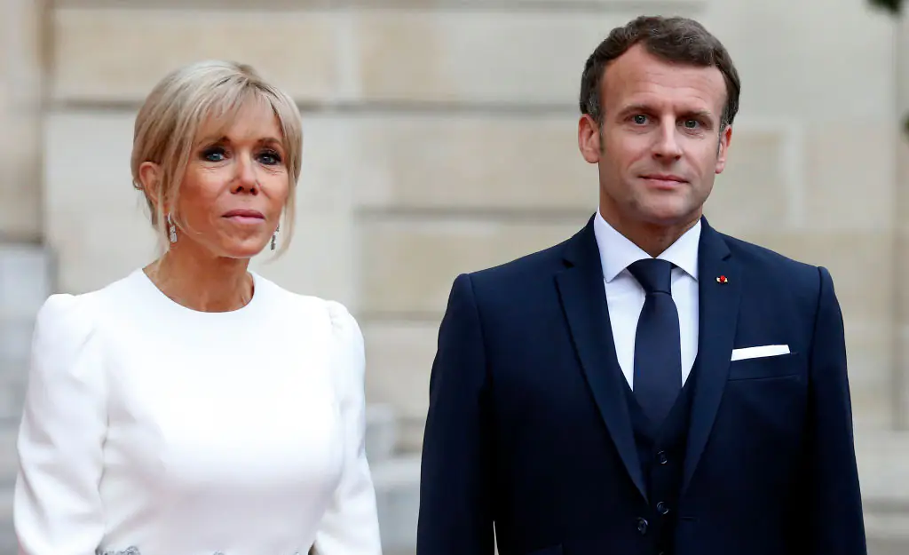 Emmanuel Macron suffers another humiliating moment with wife Brigitte as he offers her helping hand off plane