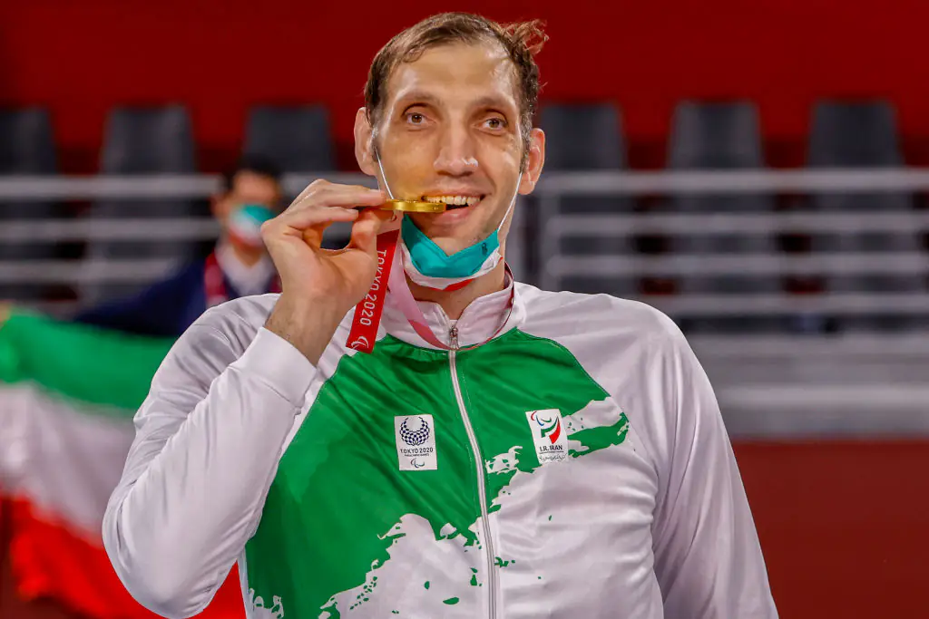 Towering 8-foot Paralympian forced to sleep on the floor in athlete village