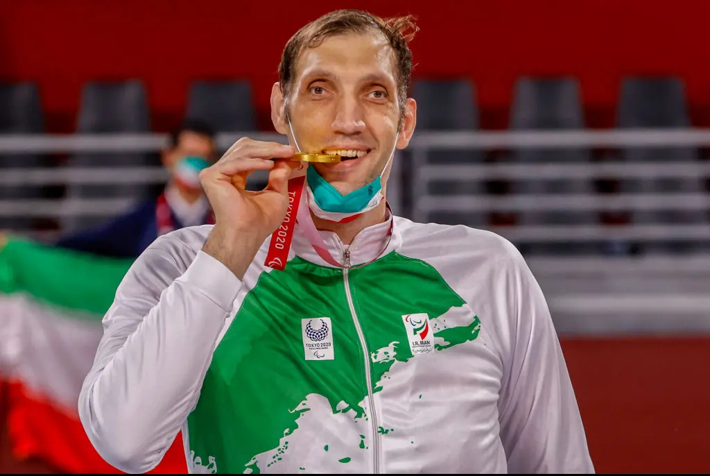 Towering 8-foot Paralympian forced to sleep on the floor in athlete village