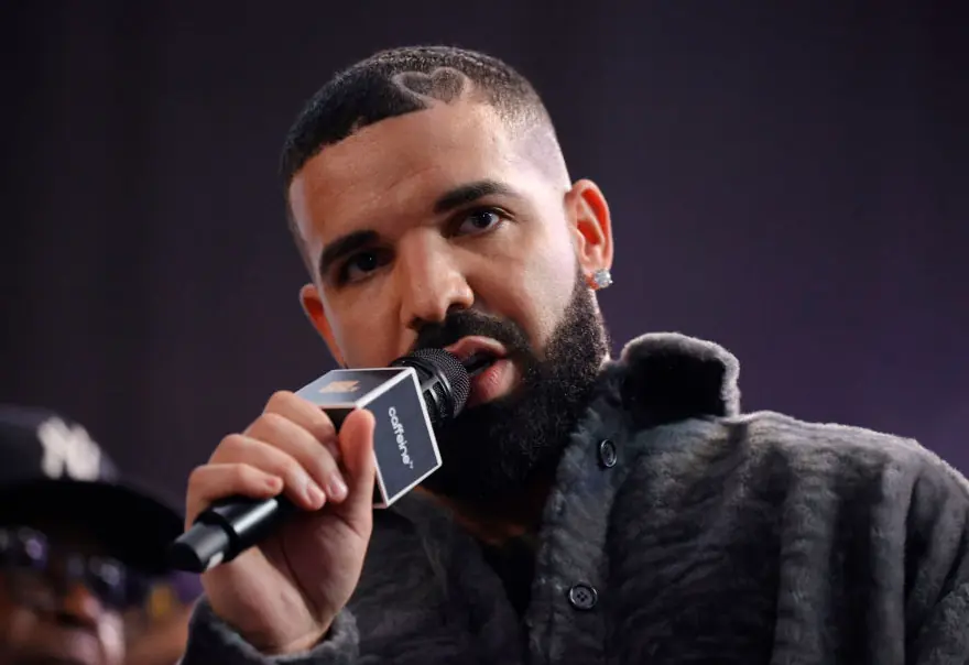 Drake addresses rumors he got a BBL and fake six-pack through cosmetic surgery