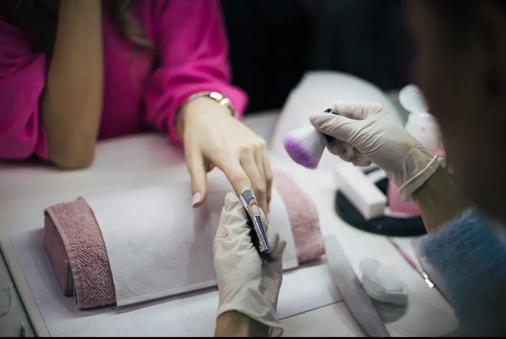 A woman on TikTok has explained how she completes her daily tasks with 4ft acrylic nails. Credit:	Milorad Kravic / Getty