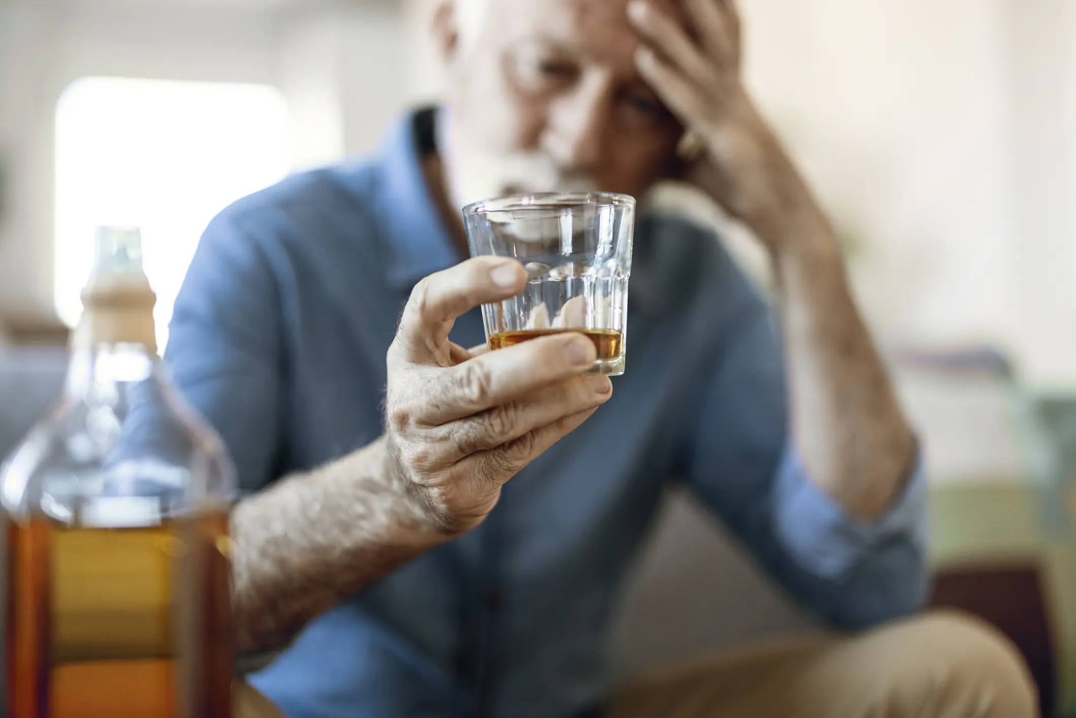 Lying about your drinking is a red flag that shouldn’t be ignored. Credit: PixelsEffect / Getty