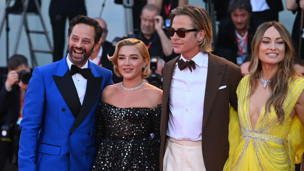 Nick Kroll, Florence Pugh, Chris Pine and Olivia Wilde attend the Don't Worry Darling red carpet at the 79th Venice International Film Festival in 2022 in Venice, Italy. 