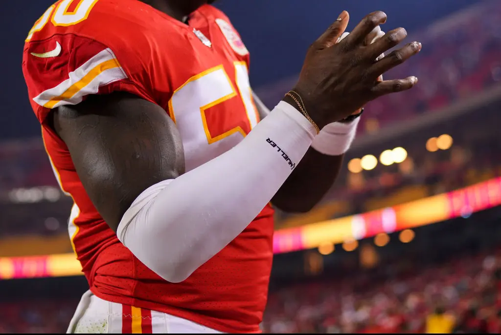 Compression sleeves are also worn during other sports such as football. Credit: Cooper Neill/Getty