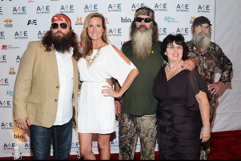 Phil Roberston with  Willie Robertson, Korie Robertson, Miss Kay Robertson, and Si Robertson. Credit: Jason Kempin / Getty