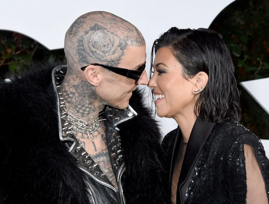 Kourtney Kardashian told Travis Barker not to look at his 'favorite thing' while she gave birth