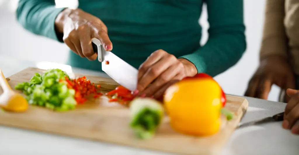 Clueless man is slammed for bringing cutting board to sick girlfriend's bed so she could 'help make dinner'