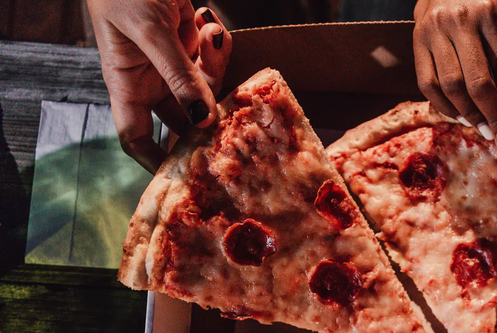 The guests appeared to be delighted by the pizza delivery. Credit: LeoPatrizi/Getty Images
