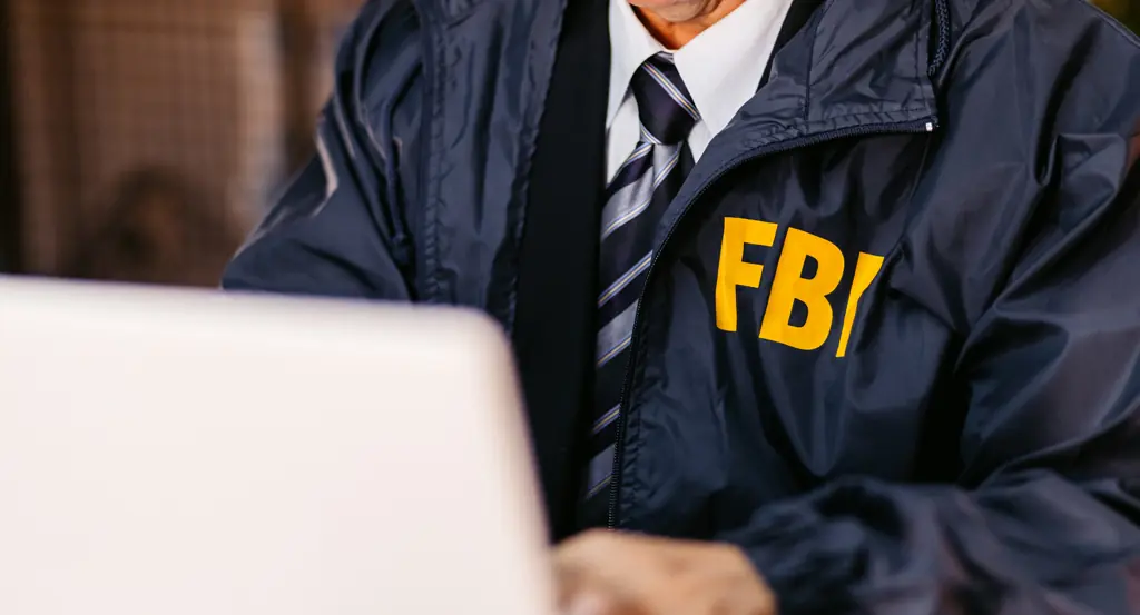 Pastor's home is searched by FBI months after he announced to congregation that his wife had taken her own life