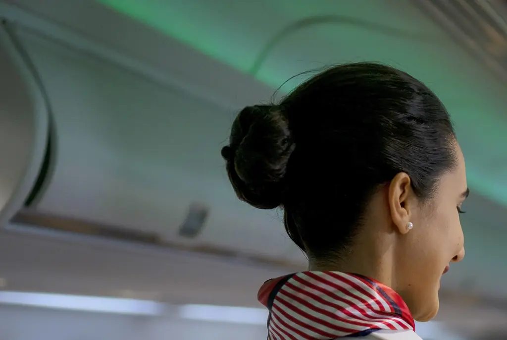 Flight attendant shares real reason cabin crew greet passengers as they board