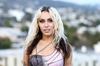 Miley Cyrus channels Kanye West's wife Bianca Censori as she appears in public wearing see-through dress