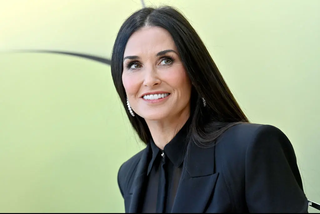 Demi Moore pauses speech to scold audience while introducing Cher at Cannes