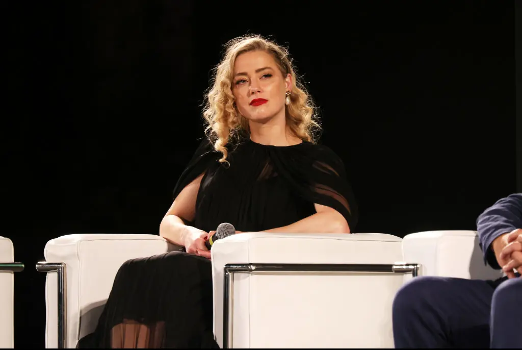 Amber Heard responds to reports that Johnny Depp has arrived in Spain where she's started a new life and 'changed her name'