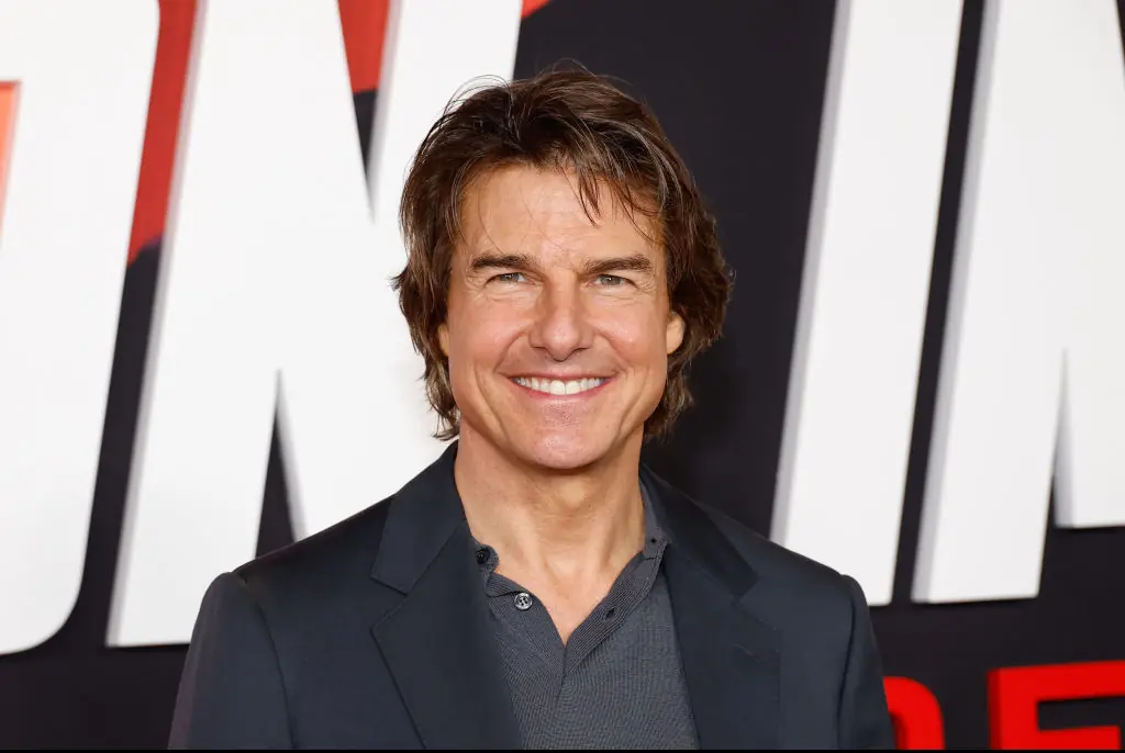 Tom Cruise heads to Eras tour in London while estranged daughter Suri graduates high school with new name