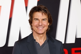 Tom Cruise heads to Eras tour in London while estranged daughter Suri graduates high school with new name