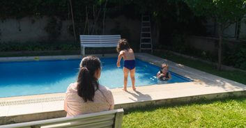 Grieving mom issues stark warning after her two kids drown while playing viral pool game
