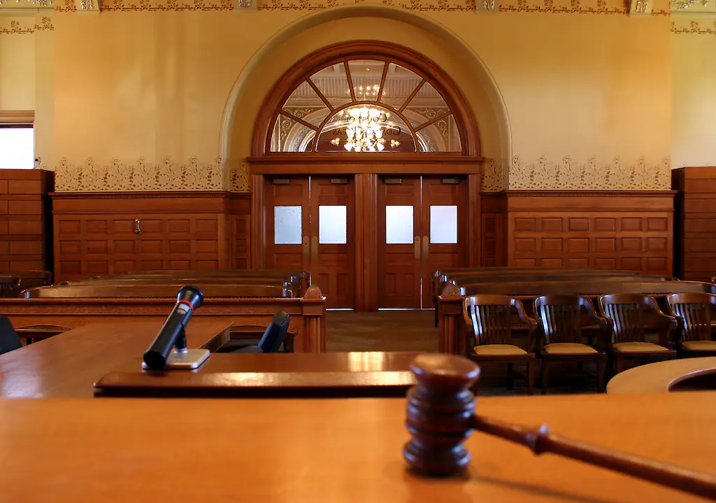 Sir Andrew McFarlane said the twin on the birth register would no longer have parental responsibility until the court hears further arguments. Credit: Ftwitty / Getty
