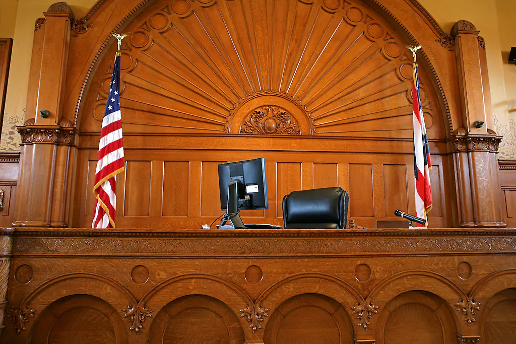 A cop appeared in a virtual courtroom pantsless. Credit: Ftwitty / Getty