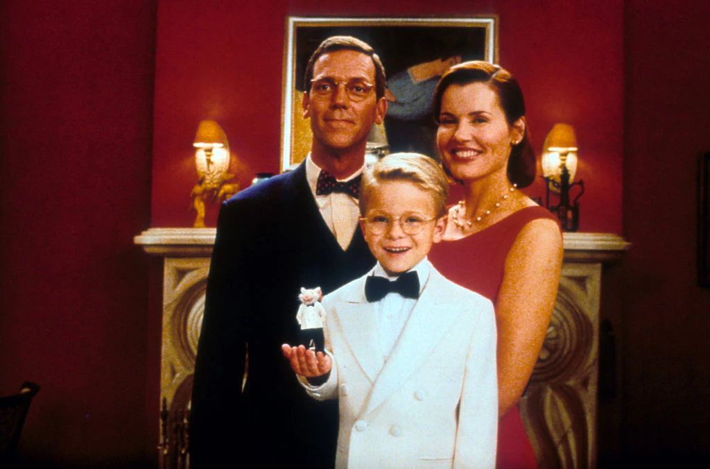 Hugh Laurie, Jonathan Lipnicki, and Geena Davis in Stuart Little (1999). Credit: Archive Photos / Getty
