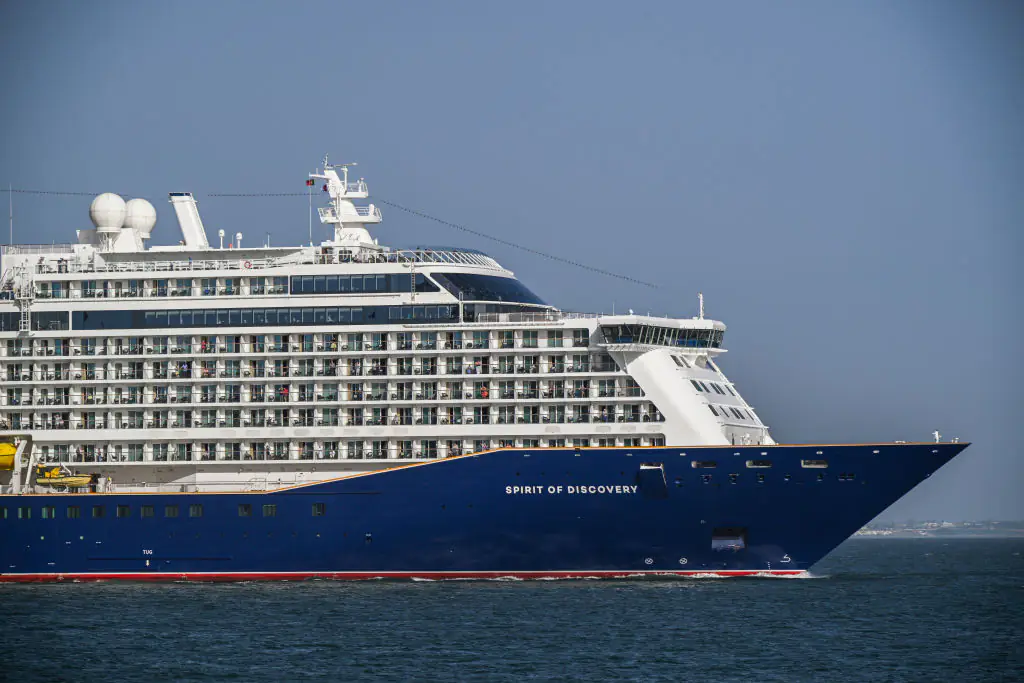 Passenger died and more than 100 others injured after cruise ship was battered by 30ft waves: Report