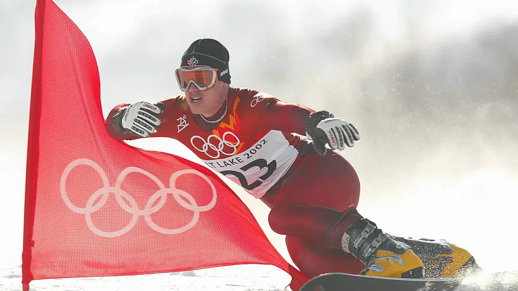 14 Feb 2002: Ryan Wedding of Canada competes in the qualifying round of the men's parallel giant slalom snowboarding event during the Salt Lake City Winter Olympic Games at the Park City Mountain Resort in Park City, Utah. DIGITAL IMAGE. Mandatory Credit: Adam Pretty/Getty Images