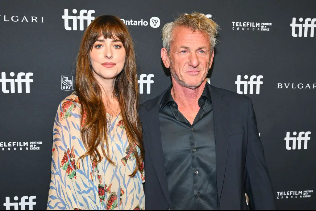 Dakota Johnson and Sean Penn's rated-r film, Daddio, was displayed on the screen. Credit: Michael Buckner / Getty