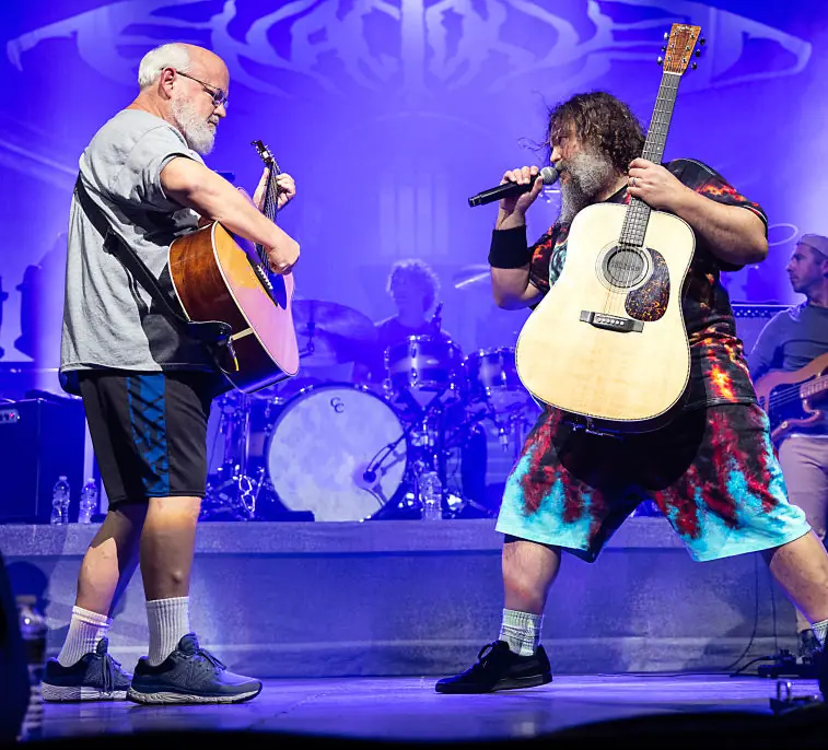 Kyle Gass and Jack Black performing on stage as Tenacious D. Credit: Jeff Hahne  / Getty