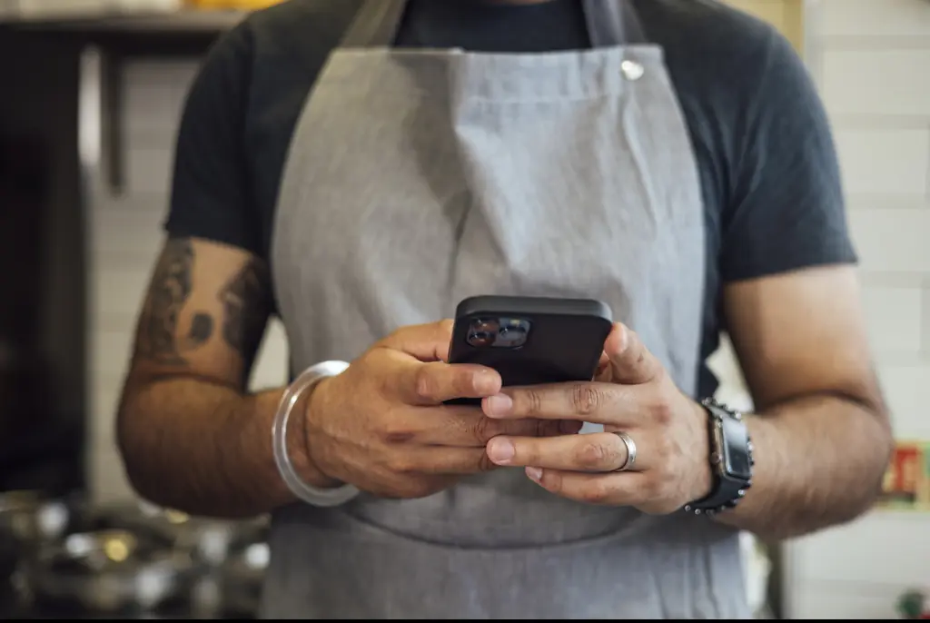 Your phone is home to lots of bacteria. Credit: SolStock/Getty