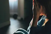 Woman crying alone.