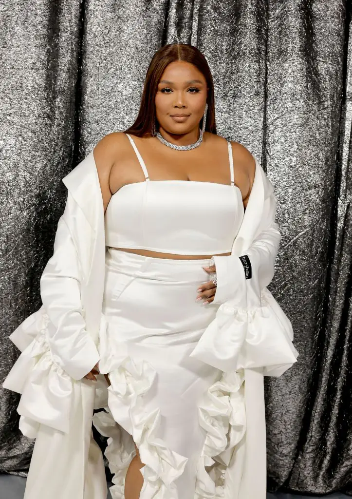 Lizzo's Instagram post consisted of her wearing braids and a frilly white dress. Credit: Kevin Winter/WireImage/Parkwood