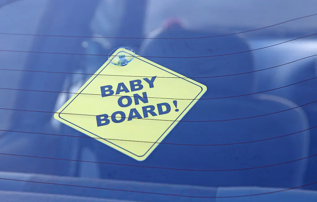 There have been mixed messages about whether parents should use Baby On Board signs. Credit: 	shank_ali/Getty Images