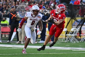 Utah State University football player Andre Seldon Jr. dies aged 22 after freak 'cliff-diving accident'