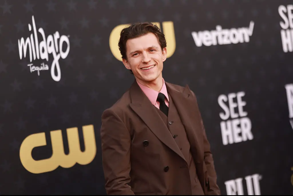 Tom Holland explains why he doesn't stand next to Zendaya at red carpet events